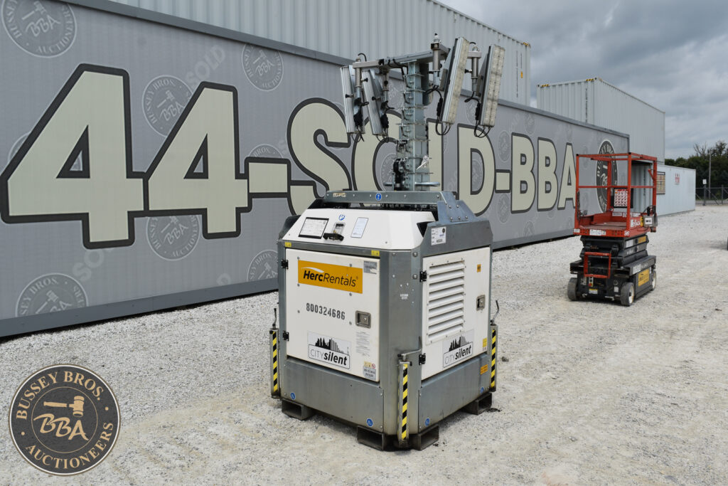Aerial lift and container at Bussey Bros Auction.