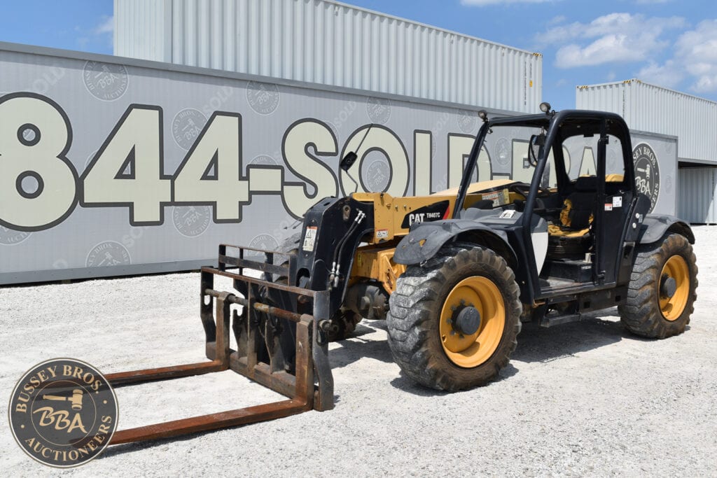 Yellow and black forklift at Bussey Bros auction site.