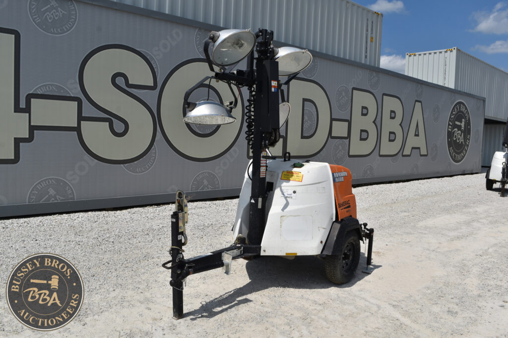 Portable mobile lighting tower for construction and event lighting.