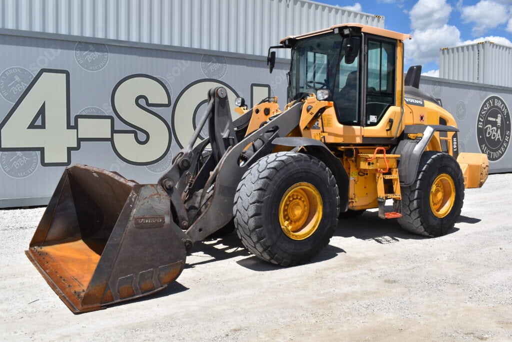 Yellow heavy equipment loader at Bussey Bros Auctioneers.