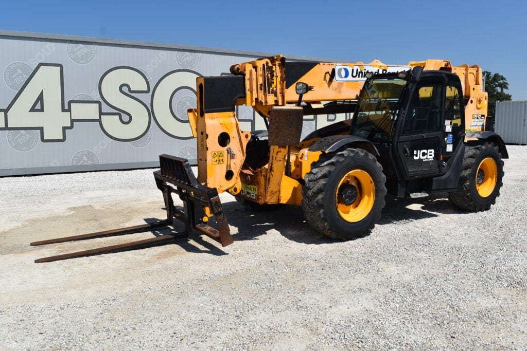 JCB telehandler at Bussey Bros Auction with forklift attachment.