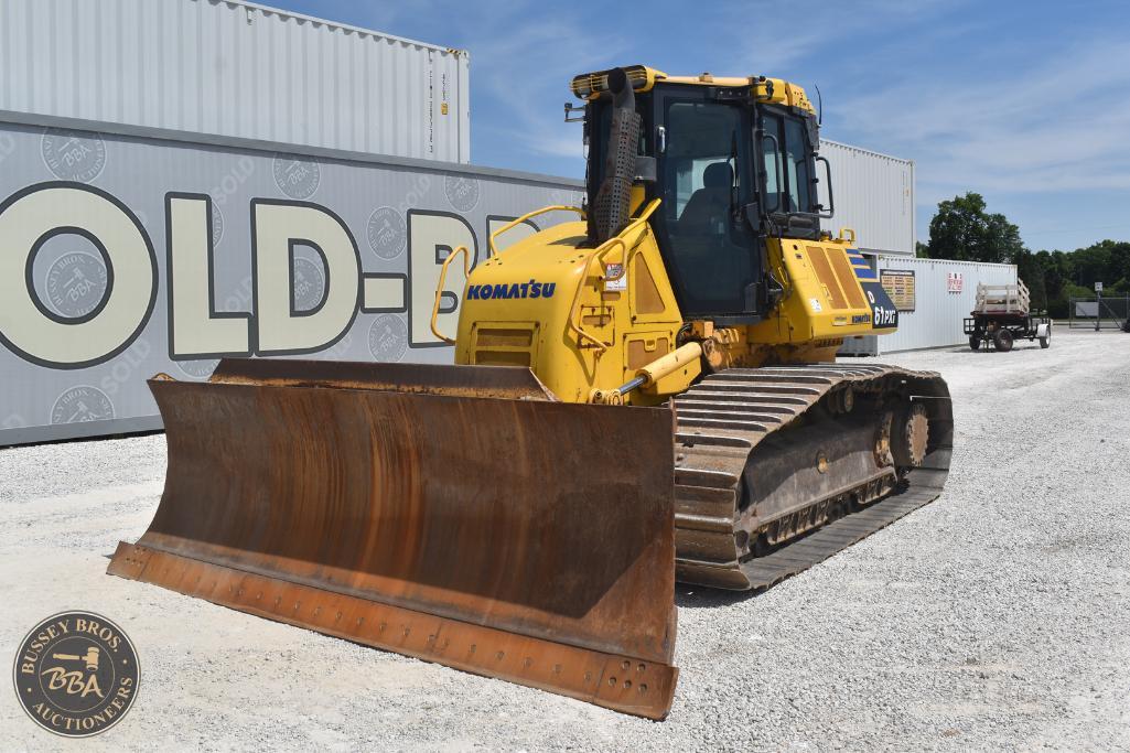 Komatsu bulldozer with blade at Bussey Bros Auction.