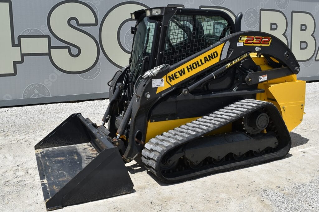 New Holland E232 compact track loader for heavy equipment auction.