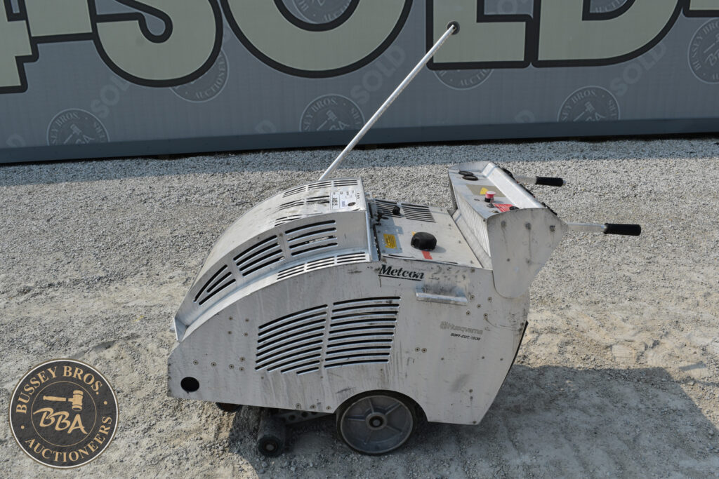 Portable industrial air compressor at Bussey Bros auction event.