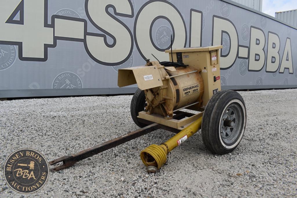 Portable industrial generator on wheels for auction at Bussey Bros Auctioneers, ideal for constructi.