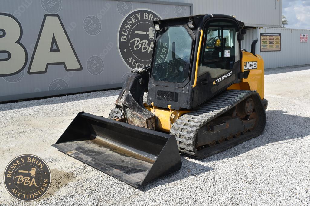 JCB mini excavator with bucket attachment at Bussey Bros Auctioneers yard.