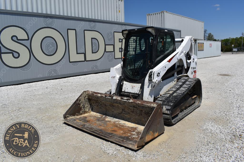 Skid steer loader for sale at Bussey Bros Auctioneers, ideal for construction and landscaping projec.