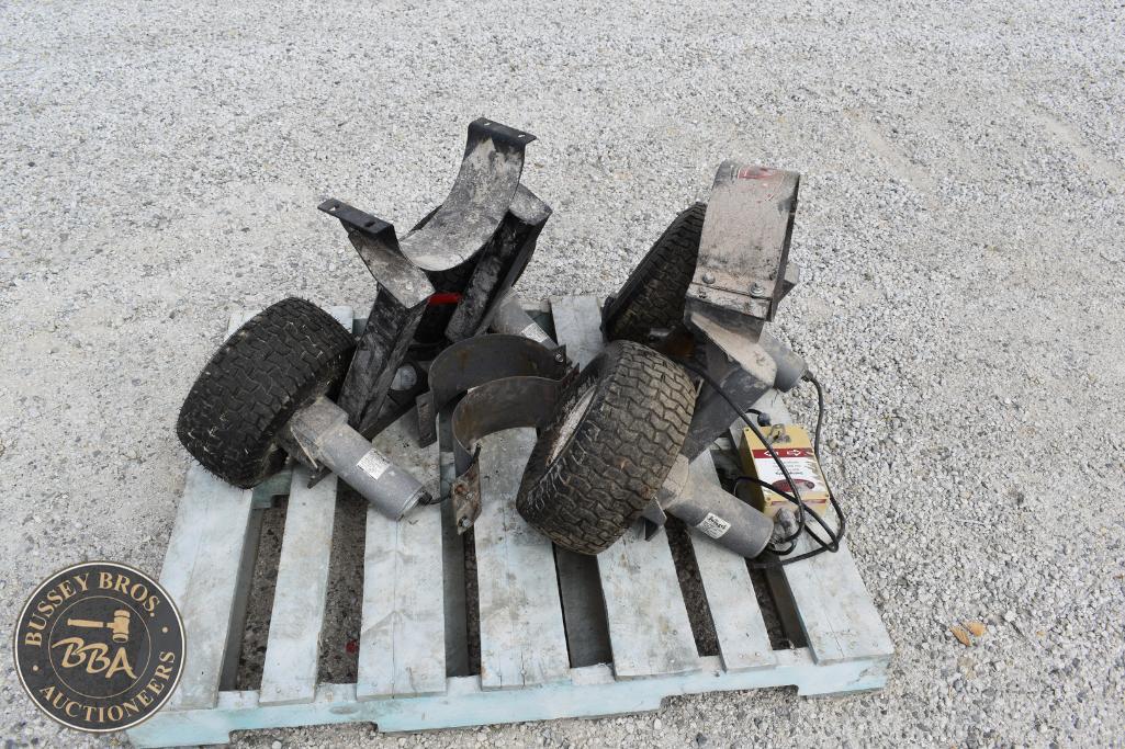 Remote-controlled car chassis and wheels for sale at Bussey Bros Auctioneers.