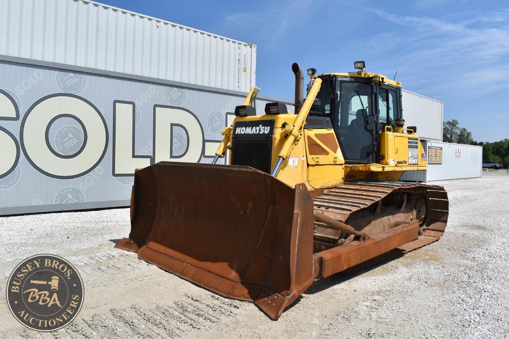 Bulldozer for sale at Bussey Bros Auctioneers, featuring Komatsu machinery and tracked design.
