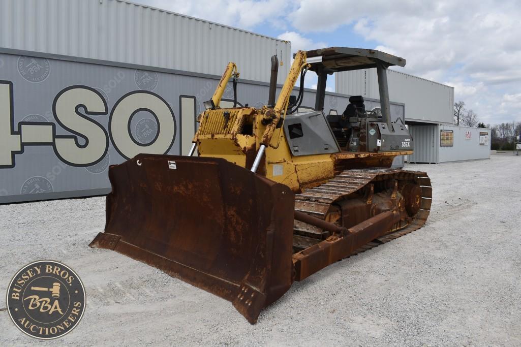 Bulldozer for sale at Bussey Bros Auctioneers, featuring tracked construction equipment and machiner.