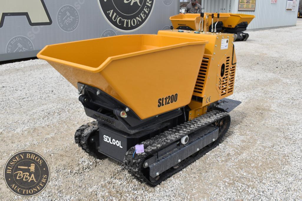 Mini dumper with tracked undercarriage for construction projects.