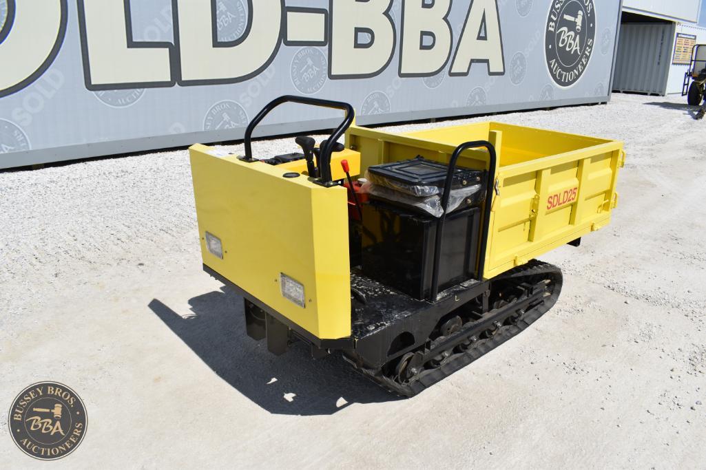 Tracked dumper vehicle for construction and industrial material transport.