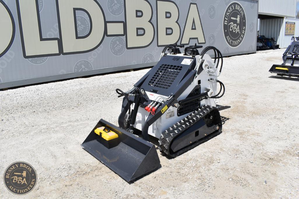 Robotic excavator with tracked wheels at Bussey Bros Auctioneers.