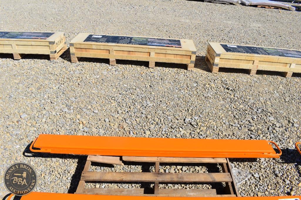 Outdoor rescue stretcher and wooden pallets at Bussey Bros Auctioneers.