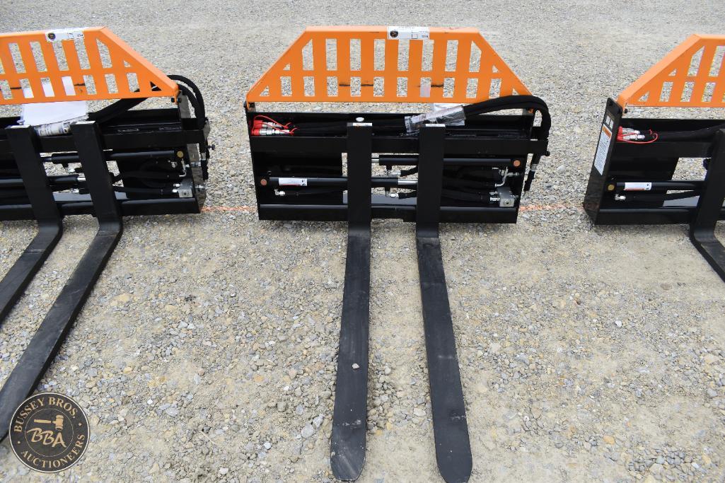 Forklift attachments for industrial use at Bussey Bros Auctioneers.