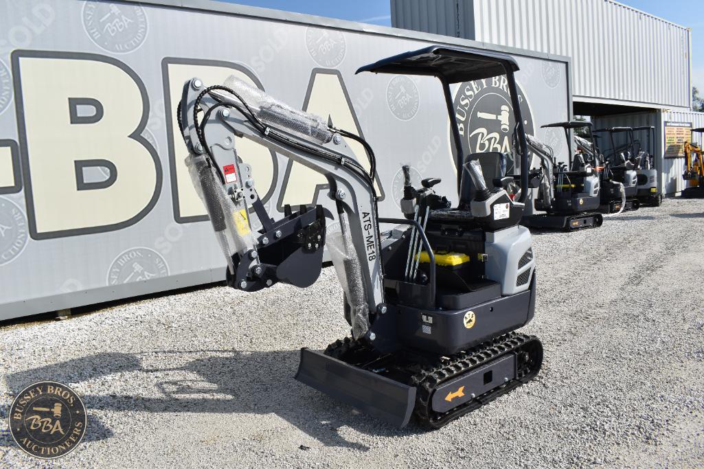 Mini excavator with hydraulic arm and tracked undercarriage at Bussey Bros Auctioneers. Perfect for.