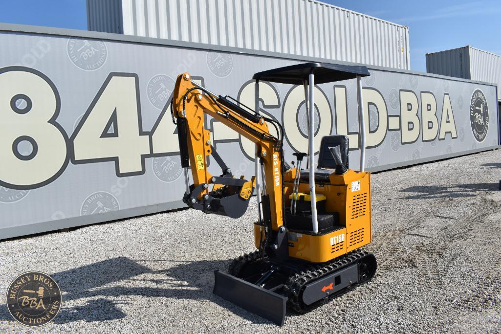 Mini excavator with tracked undercarriage and hydraulic arm, ideal for construction and landscaping.