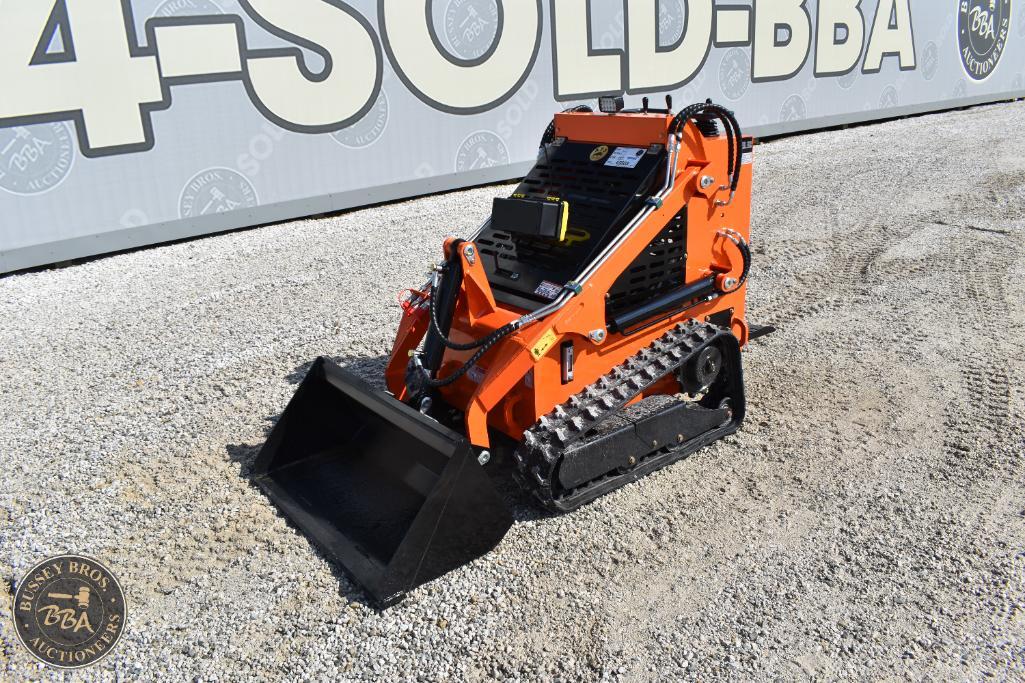 Mini excavator with tracked system for construction and landscaping projects. Compact and versatile.