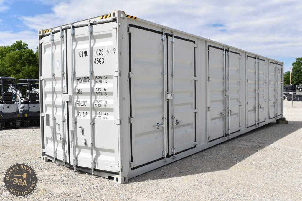 Large white shipping container for storage or transport, available at Bussey Bros Auctioneers.