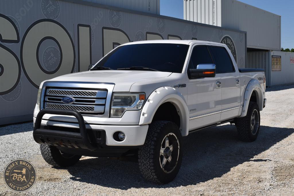 Ford F-150 pickup truck for sale at Bussey Bros Auctioneers, featuring a rugged design and off-road.