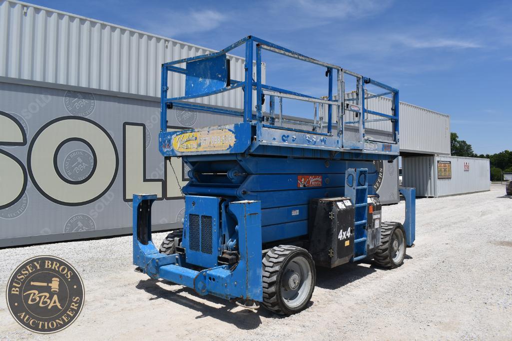 Scissor lift platform at Bussey Bros Auctioneers, ideal for construction and maintenance projects.
