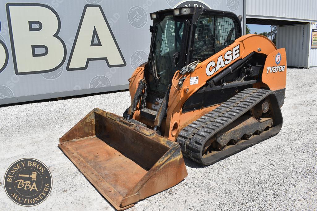 Excavator with a front bucket attachment at Bussey Bros Auctioneers, ready for sale or auction.