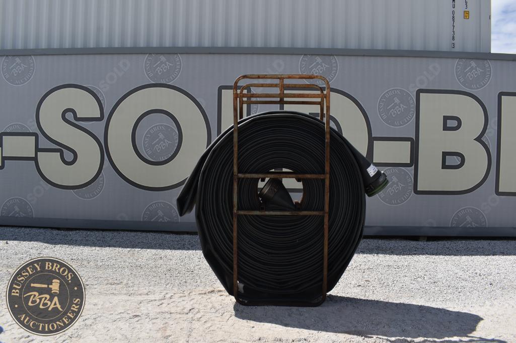 Coiled black piping on a metal cart at Bussey Bros Auctioneers.