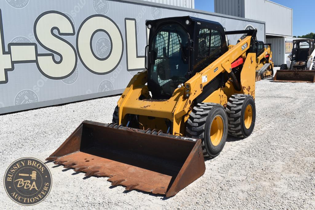 Excavator with front loader attachment, ideal for construction and landscaping projects.