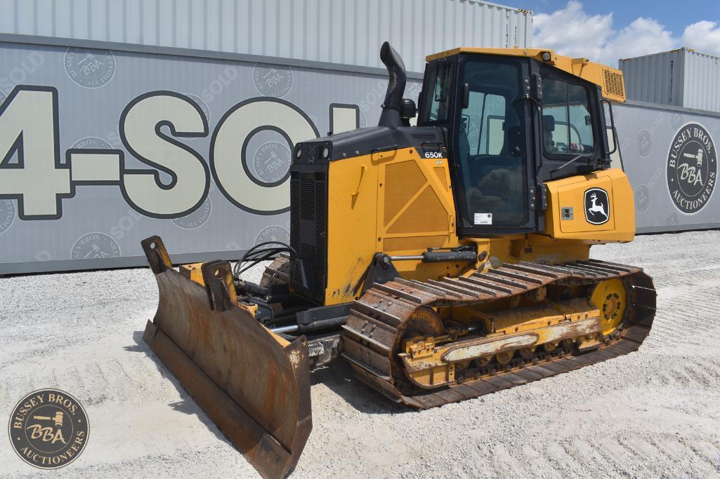 Excavator for sale at Bussey Bros Auctioneers, featuring John Deere machinery with tracked undercarr.