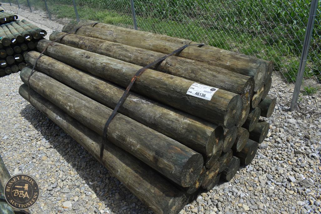 Wooden logs for sale at Bussey Bros Auctioneers, ideal for construction or landscaping projects.