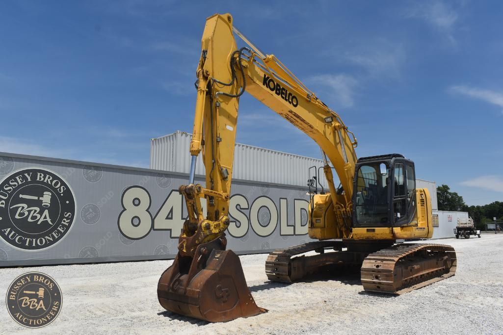 Excavator at Bussey Bros Auctioneers, ready for sale or auction.