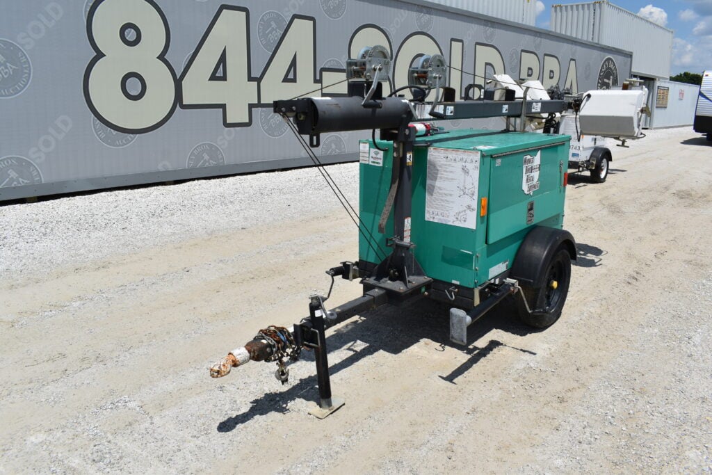 Portable light tower trailer for heavy equipment auction at Bussey Bros.