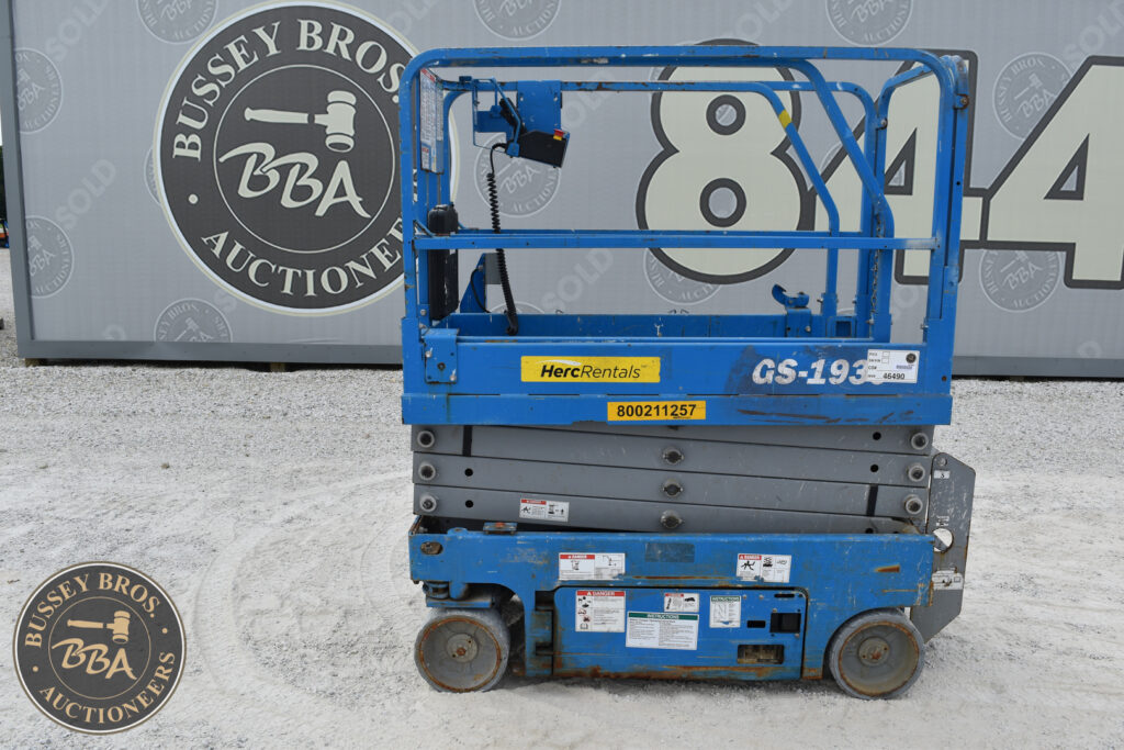 Blue scissor lift for sale at Bussey Bros auction event.