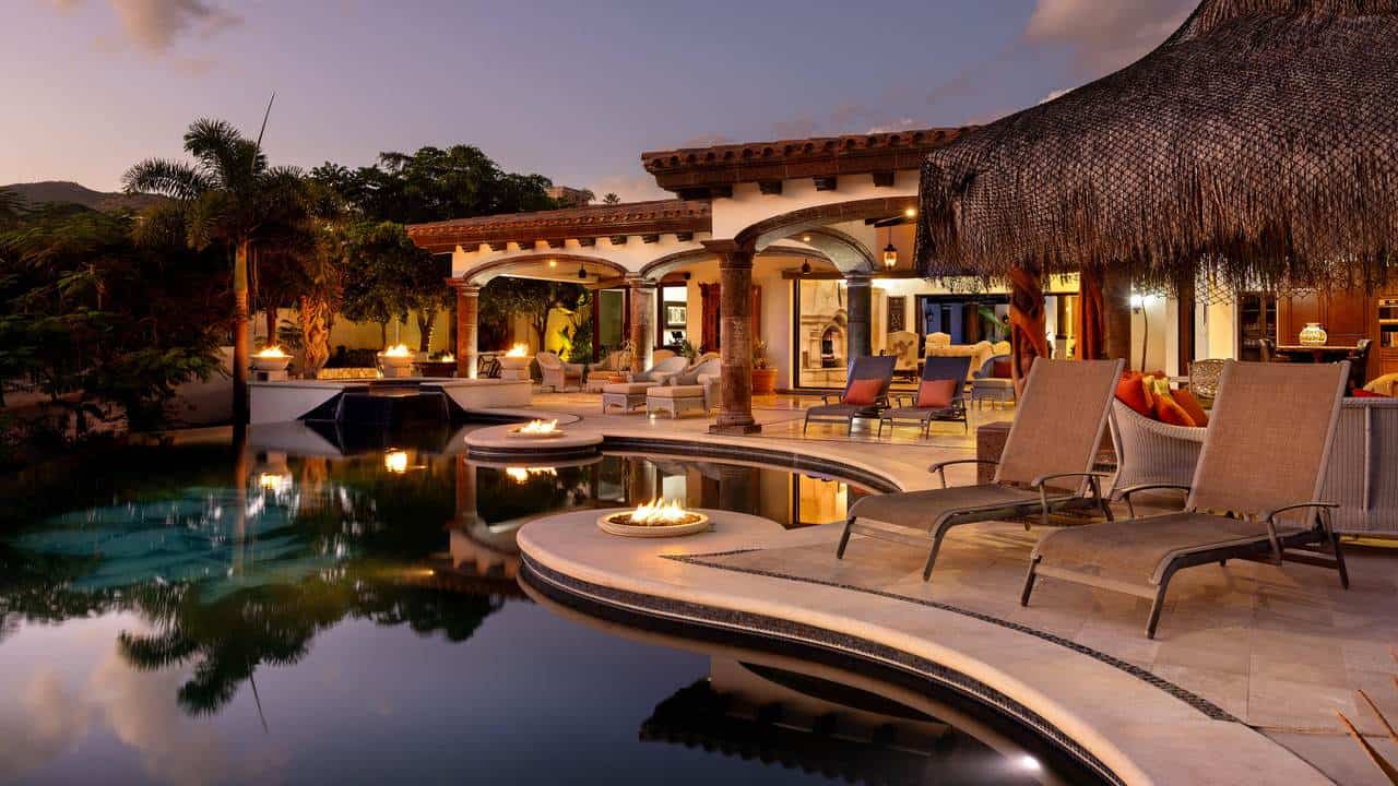 Luxury Cabo Del Sol Villa With Infinity Pool, Outdoor Fire Pits, And Elegant Lounging Areas, Showcasing Upscale Desert And Ocean Views. Perfect For Exclusive Real Estate Buyers Seeking A Tropical Retreat.