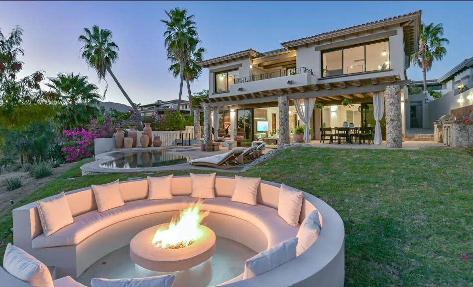 Luxurious Cabo Del Sol Beachfront Villa With Modern Design, Spacious Living Areas, Outdoor Fire Pit, Pool, And Tropical Landscaping. Perfect For Upscale Real Estate In Cabo San Lucas.