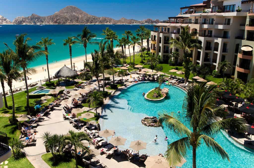 Beachfront luxury condominium buildings overlooking calm sea