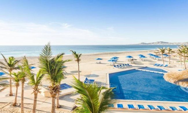 Sunset View Of Posada Real Los Cabos Pool Near Cabo Real Beaches &Amp; Pools With Palm Trees And Sea Of Cortez Horizon.