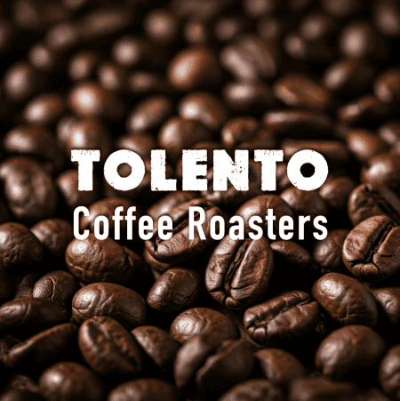Close-up of roasted coffee beans at Café Tolento, specialty grade small-batch coffee.