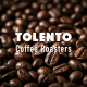 Close-up of roasted coffee beans at Café Tolento, specialty grade small-batch coffee.