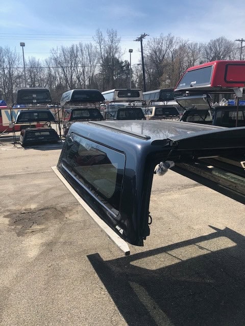 Custom truck bed cap available at Camp & Cruise for pickup trucks and vehicle accessories.