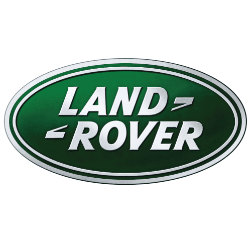 Land Rover logo on vehicle front grille parked outdoors.