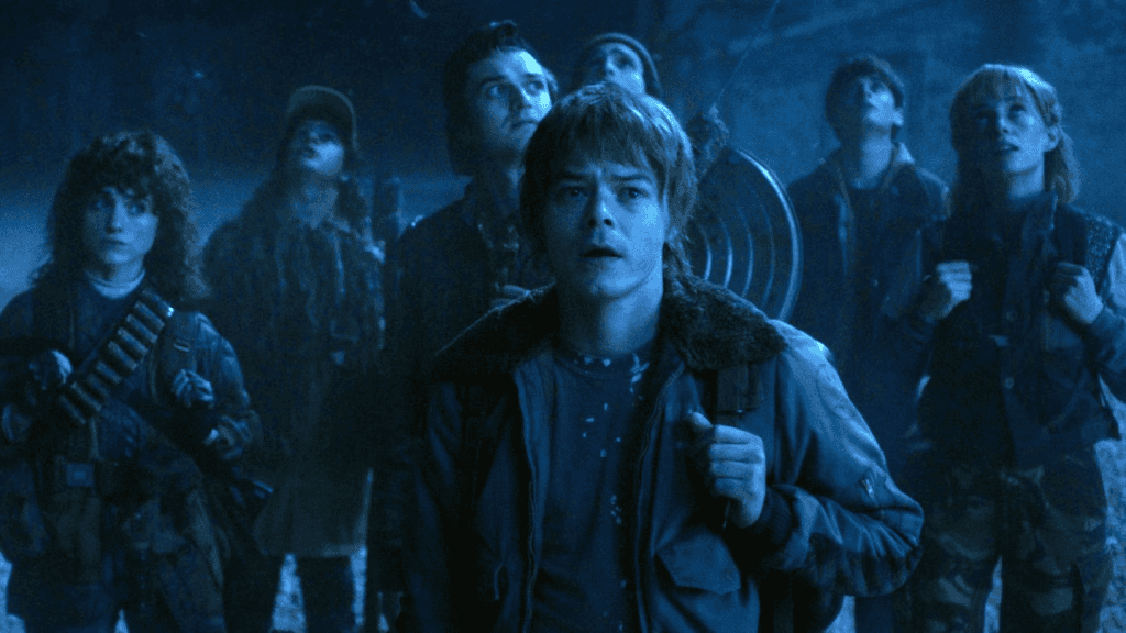 Main characters from Stranger Things Season 5 in a tense scene.