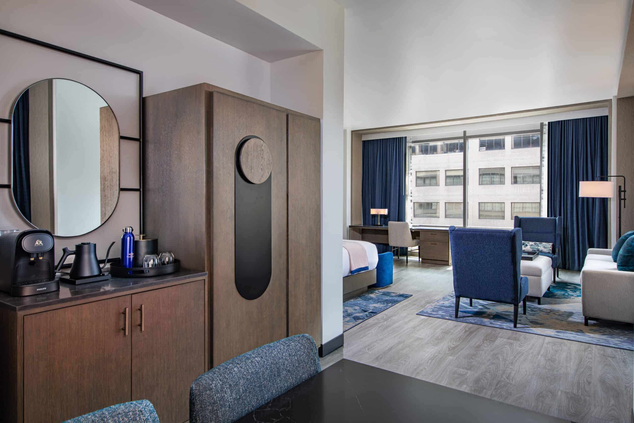 Amenities and closet area in the Capitol Hill Suite at The Royal Sonesta Capitol Hill, featuring a city view.