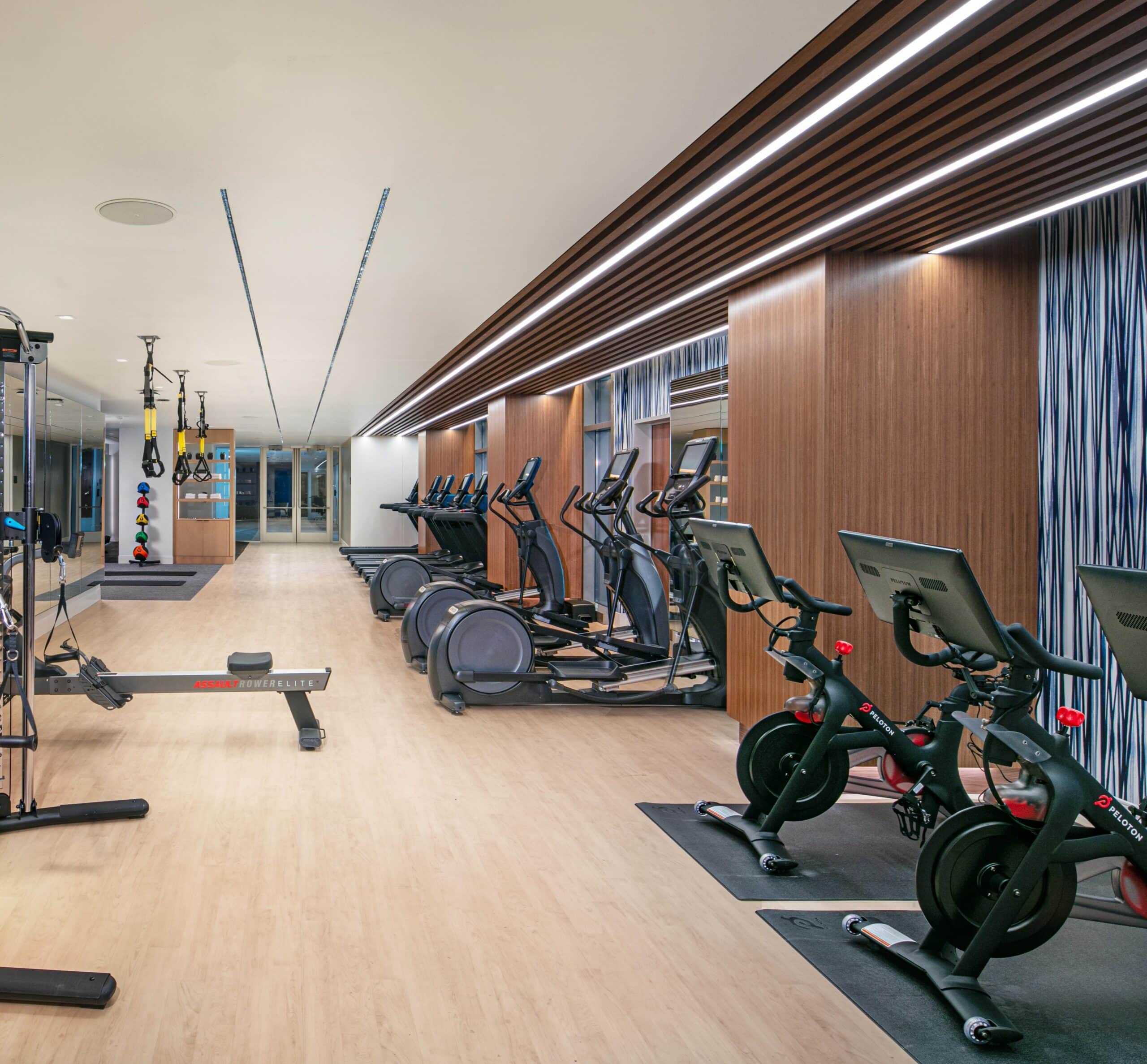 Fitness center at The Royal Sonesta Capitol Hill featuring Peloton bikes.