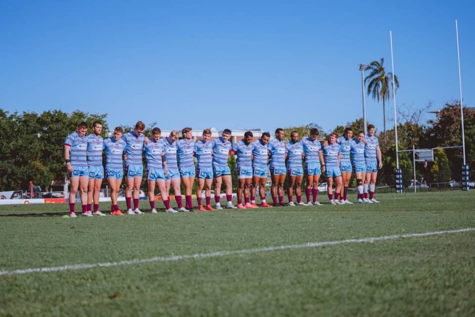 a team of rugby league players in powder blue away jerseys of the CQ Capras stand in a line prior to their game vs the Souths Logan Magpies Image By: Brian Quan | https://www.brianspov.com/