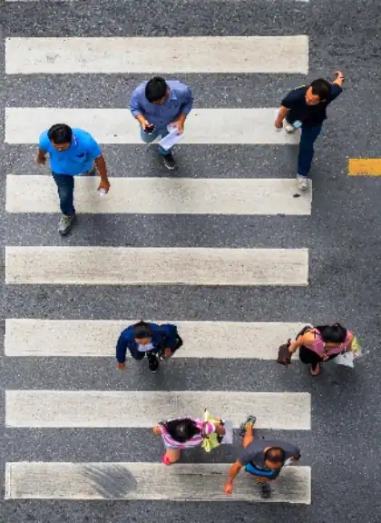 People-Crossing-Street-On-Marked-Crosswalk