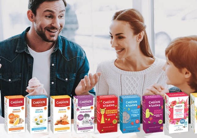A happy family enjoys rooibos tea together