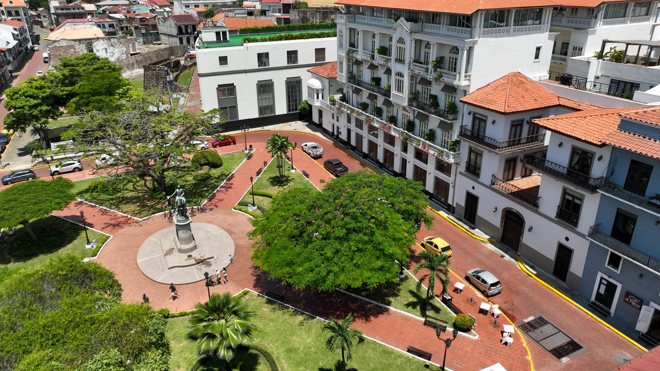 Plaza Herrera in Casco Viejo Panama with statue of General Tomás Herrera and surrounding colonial architecture near American Trade Hotel
