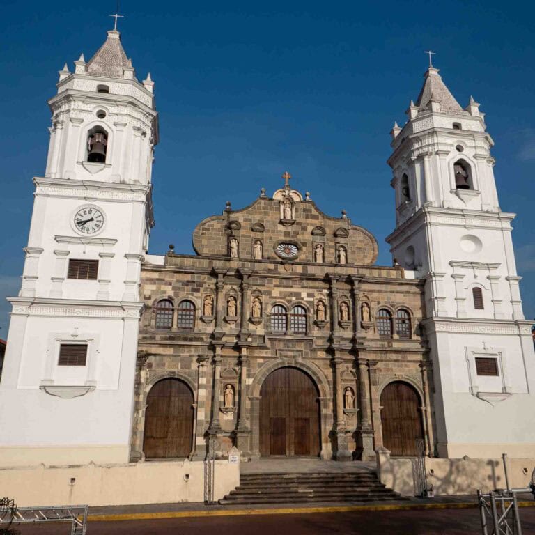 Metropolitan Cathedral Basilica of Panama in Casco Viejo with twin white bell towers and a historic stone façade