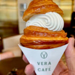 Hand holding a soft serve ice cream croissant cone from Vera Café in Casco Viejo